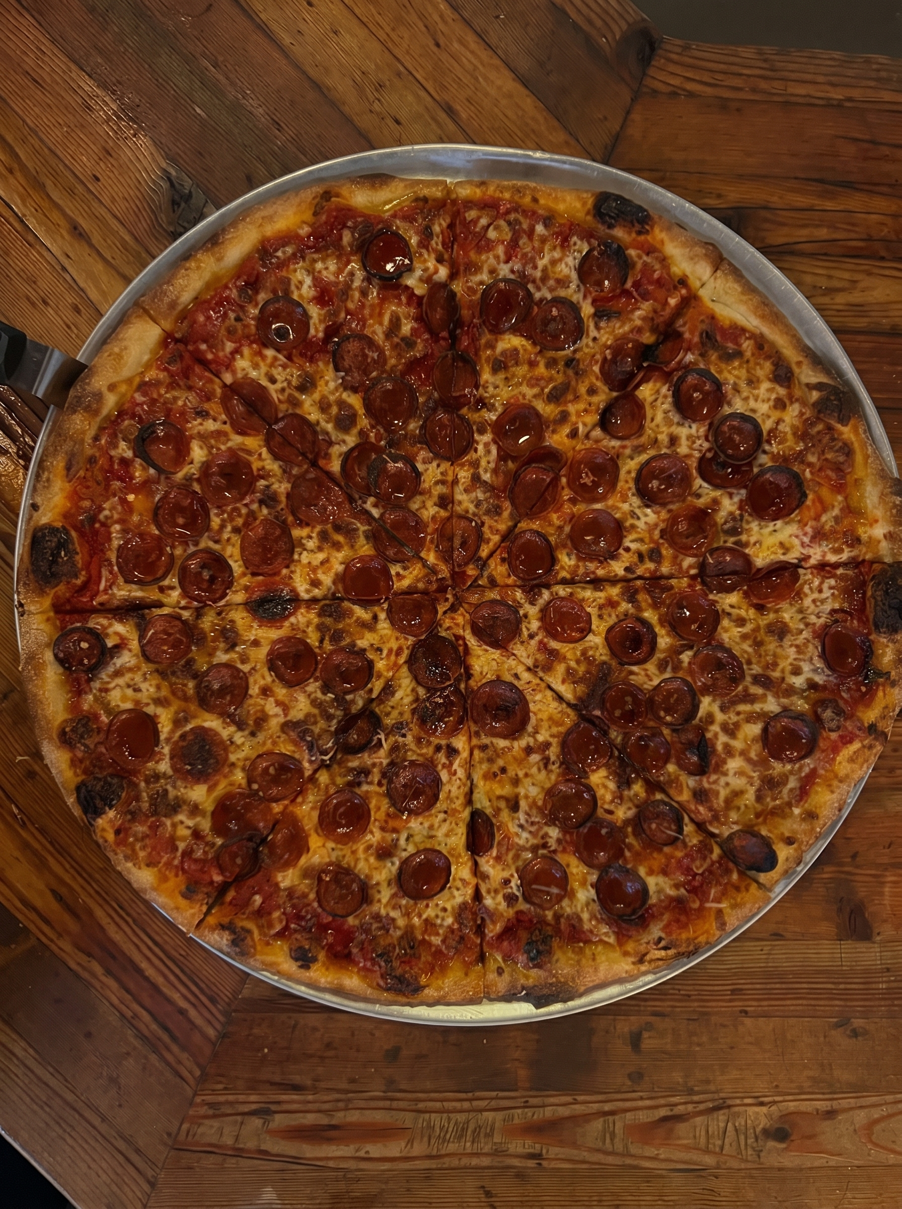 New York style pie with roasted red peppers and fresh basil